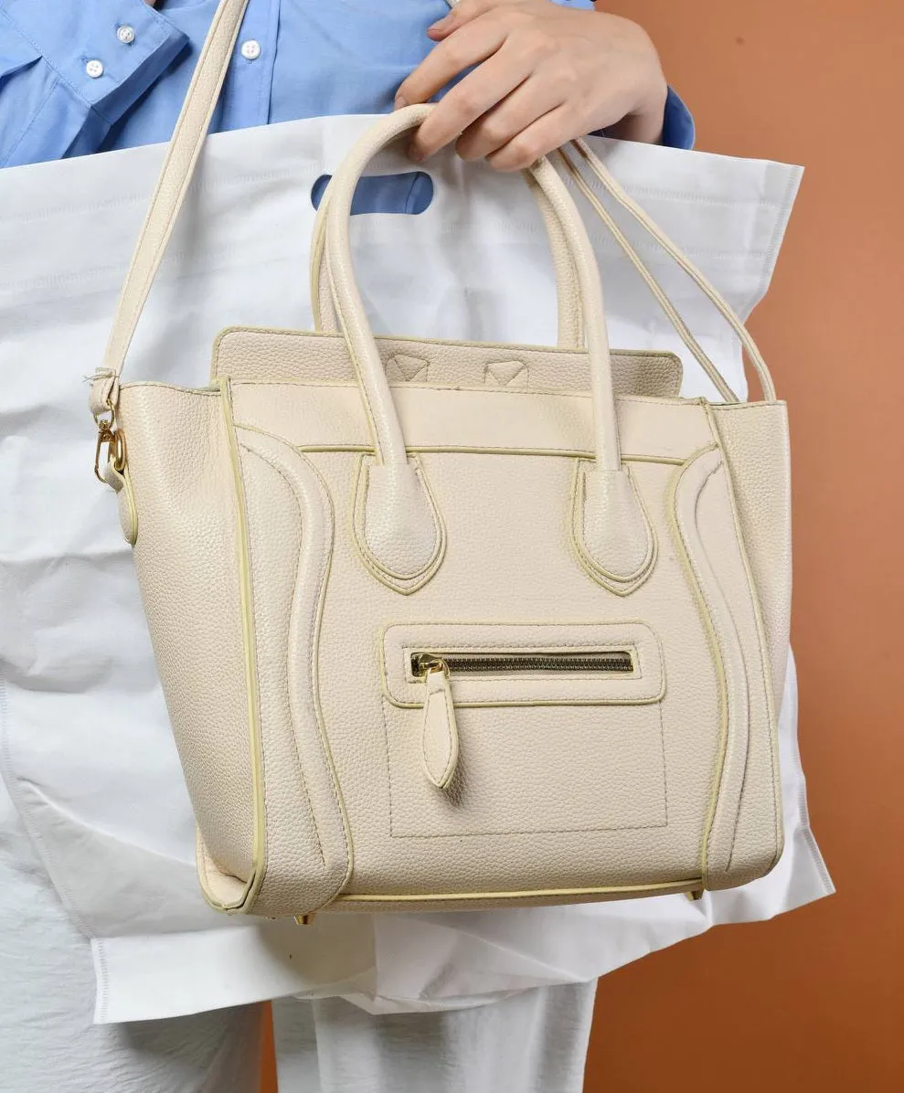 Beige handbag with a structured