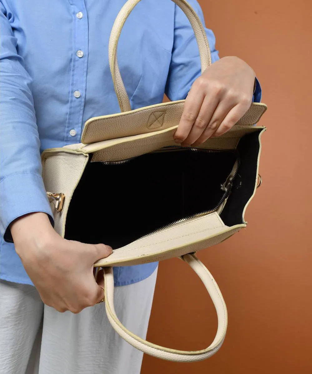 Beige handbag with a structured