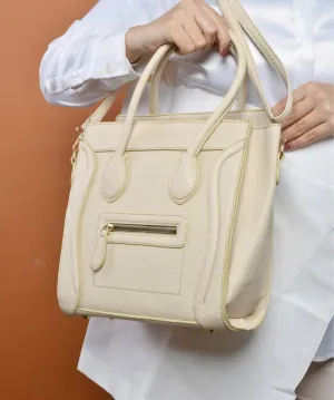Beige handbag with a structured