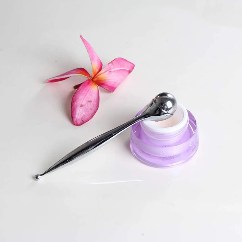 Eye cream applicator cooling metal roller massager