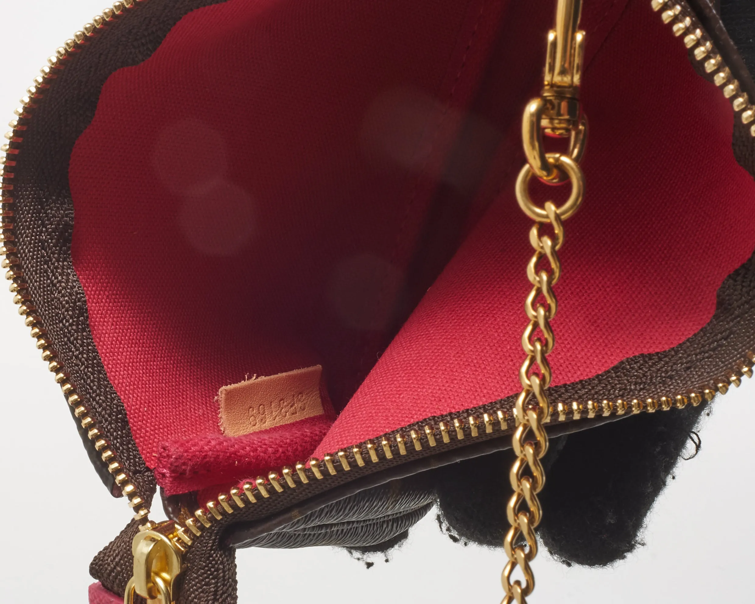 Louis Vuitton Brown Monogram Coated Canvas Christmas Animation Courchevel Mini Pochette Accessoires Bag