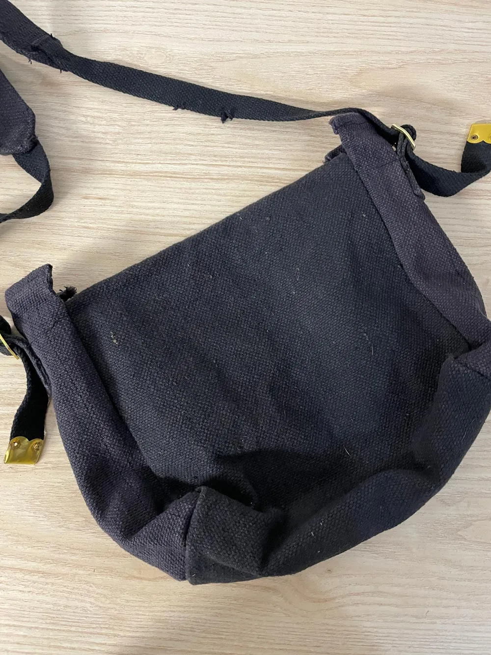 world famous faded messenger bag